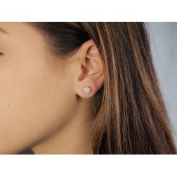 Photo of worn Small Flower Earrings with 14 Diamonds in White Gold