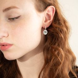 Photo of worn Kate earrings with 9x7mm Aquamarine and 50 Diamonds