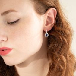 Photo of worn Kate 8x6mm Blue Sapphire and 36 Diamond Earrings