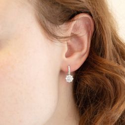 Photo of worn Earrings Lever Closure Flower Solitaire 0.17ct contoured