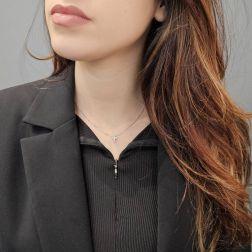 Photo of worn Necklace with 6 diamonds cross - width 6.7mm