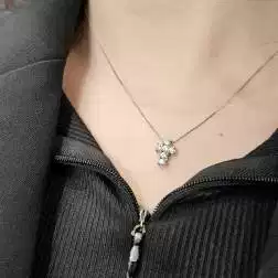 Photo of worn Necklace with 6 diamonds cross width 8.3mm