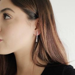 Photo of worn Scalar Tennis Earrings 3 cm with 24 Diamonds