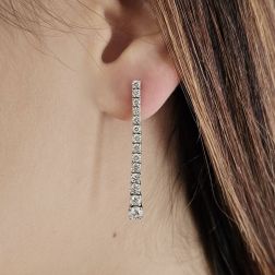 Photo of worn Scalar Tennis Earrings 3.50 cm with 28 Diamonds