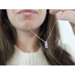 photo of worn Trilogy scalar necklace with Blue Diamond