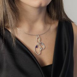photo of worn Circle Design Pendant with Diamonds and Stones in White Gold