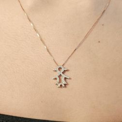 Photo of worn Baby-girl Rose Gold and Diamonds Pendant
