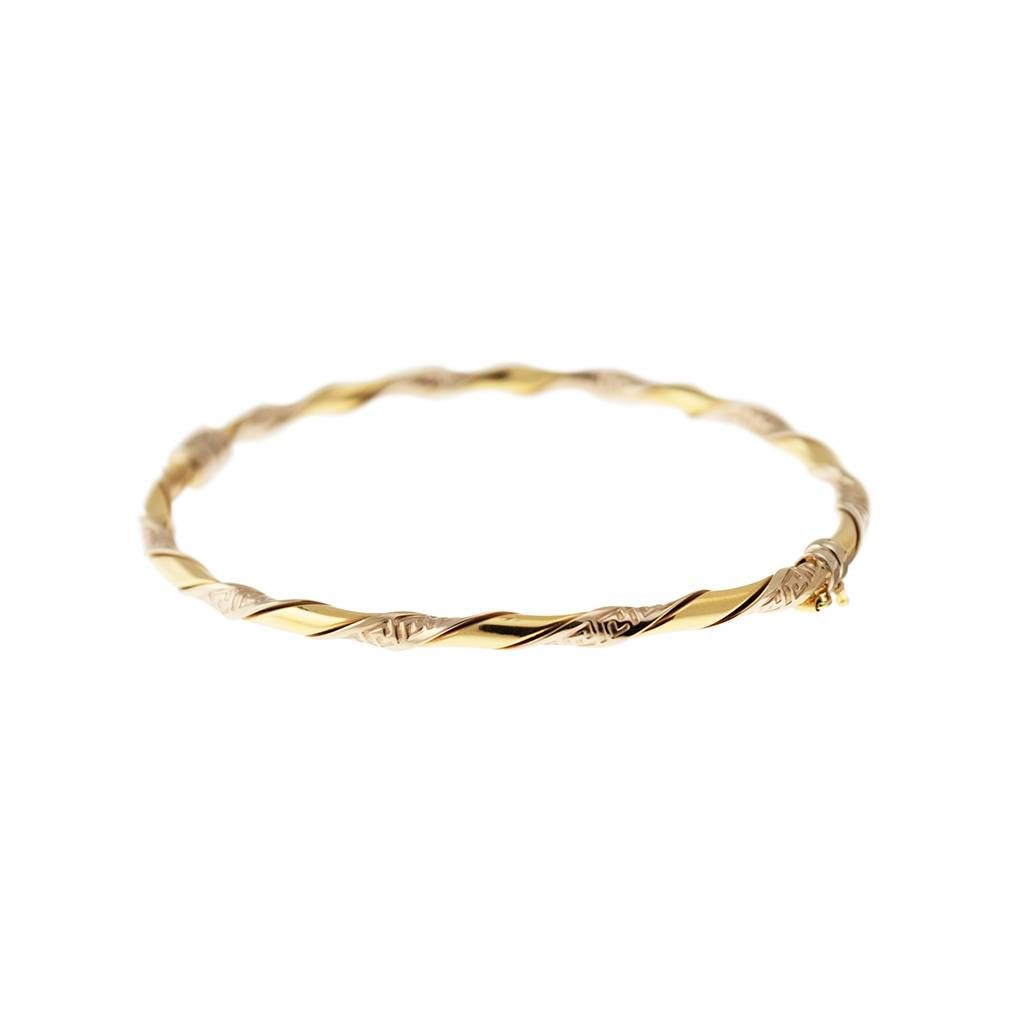 Bracelet with Greek spiral print in Yellow and White Gold