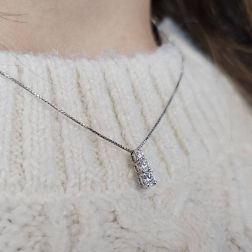 Photo of worn Scalar Trilogy Necklace in White Gold