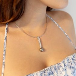 photo of worn Navette Design Pendant with 33 Diamonds and Tahitian Pearl