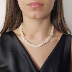 Photo of worn Strand Necklace with Oval Pearls and Bow attachment in Yellow Gold