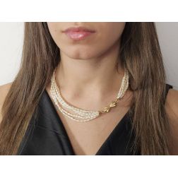 Photo of worn Strand Necklace with Oval Pearls and Bow attachment in Yellow Gold
