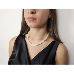 Photo of worn Strand Necklace with Oval Pearls and Bow attachment in Yellow Gold