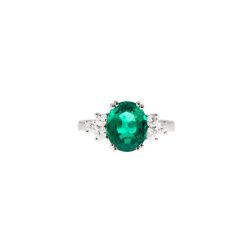 Solitaire Ring with Oval-cut Emerald and Diamonds