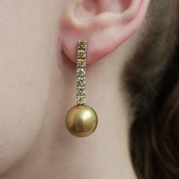 Photo of worn Pendant Earrings with Gold Pearl and Brown Diamonds