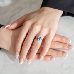Photo of worn White Gold Kate Ring with 8x6mm Sapphire and 12 Diamonds