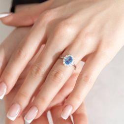 Photo of worn White Gold Kate Ring with 8x6mm Sapphire and 12 Diamonds