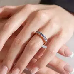 Veretta 7 Zaffiri Blu da 1.424ct in Oro Rosa foto indossata