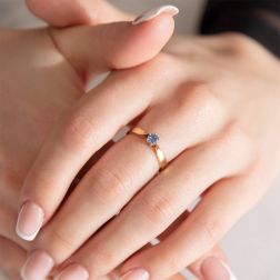 Photo of worn Solitaire Ring with 0.362ct Blue Sapphire in Yellow and White Gold