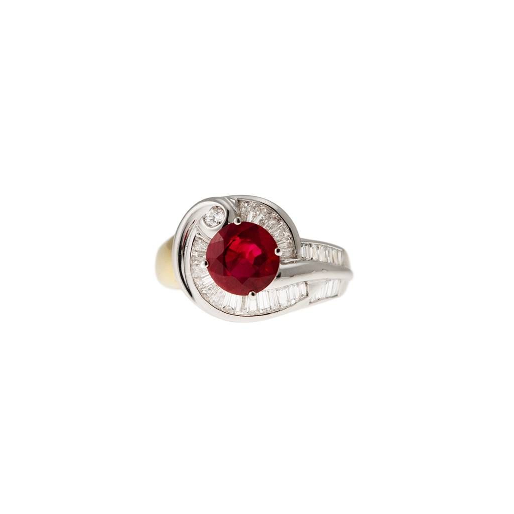 Solitaire Design surrounded with Ruby and Baguette Diamonds