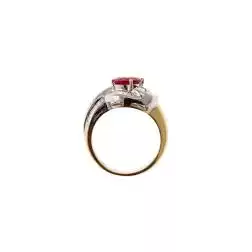 Solitaire Design surrounded with Ruby and Baguette Diamonds