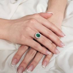 Photo of worn Kate Emerald Ring 9x6mm of 1.779ct and 12 Diamonds