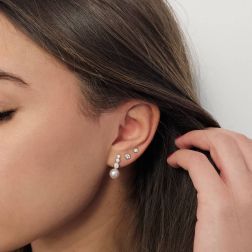 Photo of worn Circle Point of Light Earrings 4.50mm