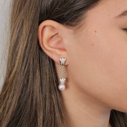 Photo of worn Chain earrings with Akoya Pearls and Diamonds in White and Yellow Gold