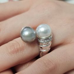 Photo of worn Contrariè Tahitian and Australian Pearl ring with Diamonds
