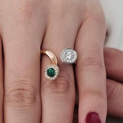 Photo of worn Emerald and Diamonds Steli Ring in Rose and White Gold