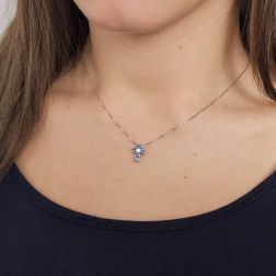 Photo of worn Blue sapphire cross necklace - Width 8.3mm
