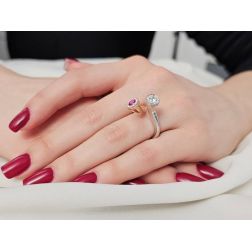 Photo of worn Diamond and Ruby Steli Ring in Rose and White Gold
