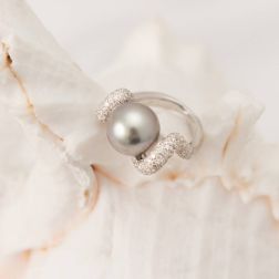 Photo of worn Wave Design Ring with Tahitian Pearl and Pavé Diamonds