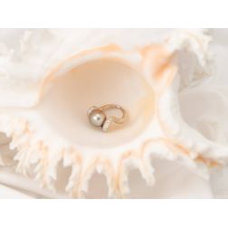 Photo of worn Wave Design Ring with Tahitian Pearl and Pavé Diamonds