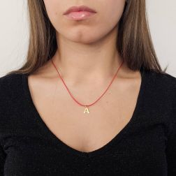Photo of worn Initial Letter A Pendants in Yellow Gold