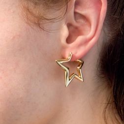 Photo of worn Yellow Gold Star Hoops Earrings