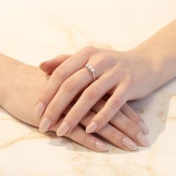 Photo of worn Trilogy Ring Cross Vault 0,40ct