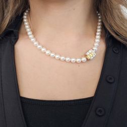 Photo of worn Akoya Pearl Necklace with Interlocking Clasp and Diamond Strips