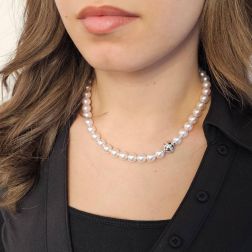 Photo of worn Akoya Pearl Necklace with Sphere Clasp in White Gold and 18 Diamonds
