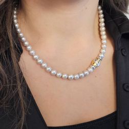 Photo of worn Akoya Gray Pearl Necklace with Oval Box Clasp in Two Golds