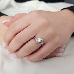 Photo of worn 0.76ct "Louvre" Double Diamond Platinum Surrounded Solitaire Ring