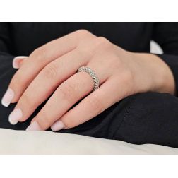 Photo of worn Platinum and 24 Diamond Veretta Eternity Ring