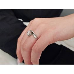 Photo of worn 0.76ct "Louvre" Double Diamond Platinum Surrounded Solitaire Ring