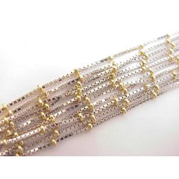 Necklace white gold veneta wires and yellow gold details.