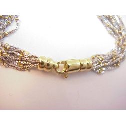 Necklace white gold veneta wires and yellow gold details.