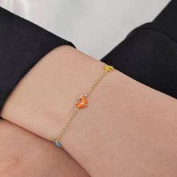 Bracciale Baby in Oro Giallo con Delfini Smaltati foto indossata