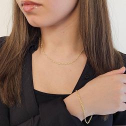 Photo of worn Yellow Gold Striped Infinity Wire Chain Bracelet