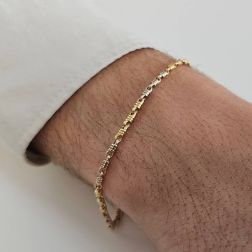Photo of worn Yellow and White Gold Spring Chain Bracelet
