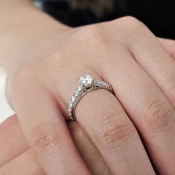 Photo of worn Solitaire "Bridge" 0.70ct GIA Diamond Platinum Signature Edge