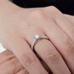 Photo of worn Solitaire "Bridge" 0.53ct GIA Diamond Platinum Signature Edge